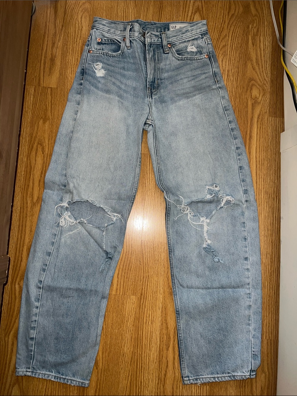 GAP Woman’s Light Wash Ripped Relaxed Jeans